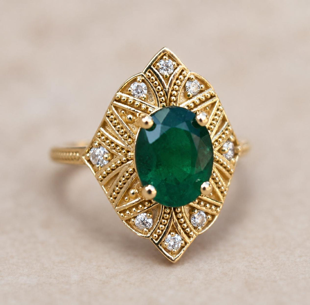 Art Deco Oval Cut Emerald Engagement Ring with Diamonds and Milgrain Shank in 14K Gold