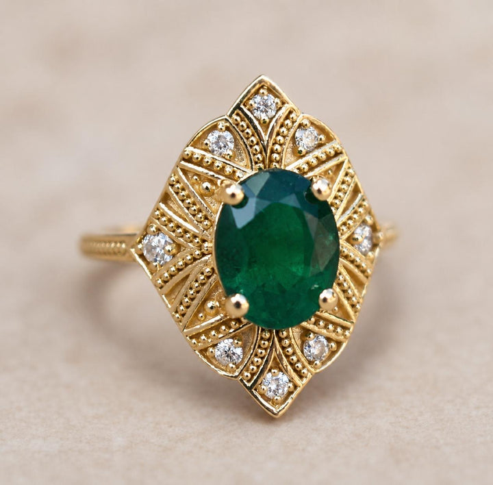 Art Deco Oval Cut Emerald Engagement Ring with Diamonds and Milgrain Shank in 14K Gold