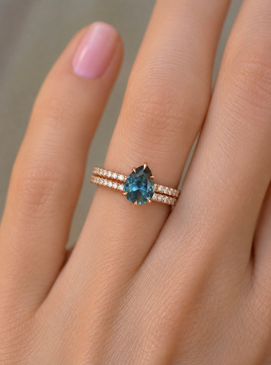 Pear Cut Teal Montana Sapphire Hidden Halo Engagement Ring Set with Matching Diamond Wedding Band in 14K Gold