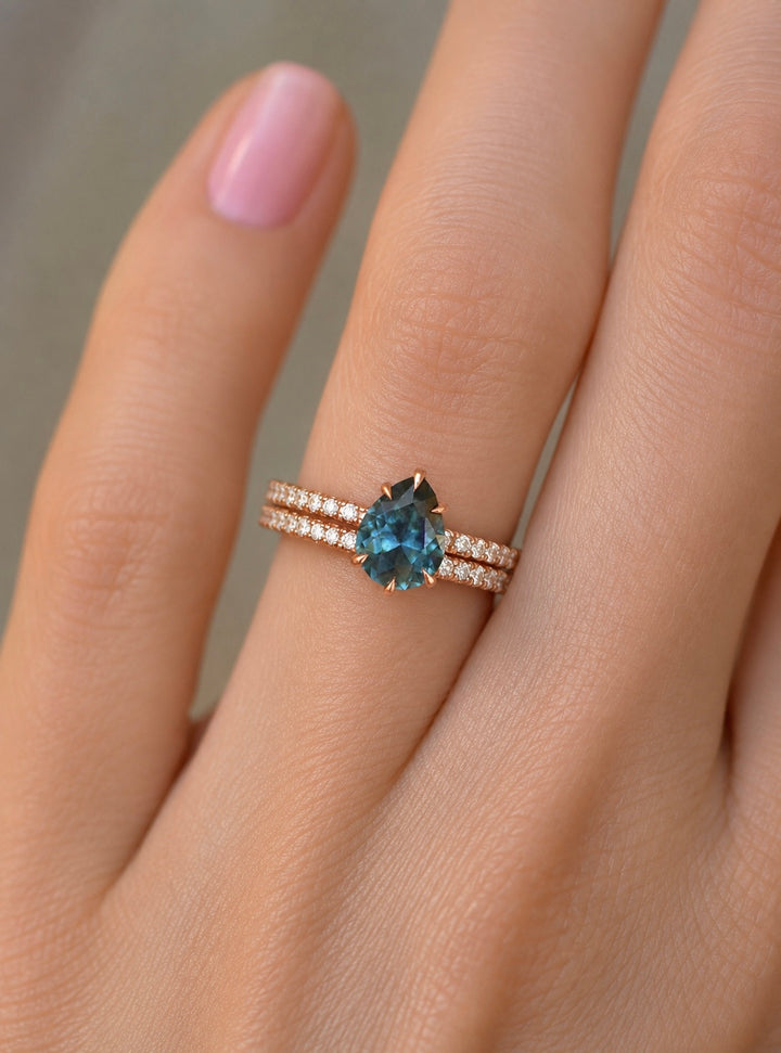 Pear Cut Teal Montana Sapphire Hidden Halo Engagement Ring Set with Matching Diamond Wedding Band in 14K Gold