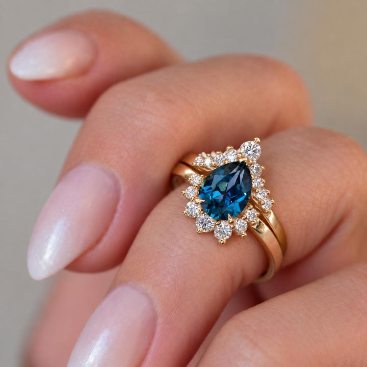 Pear Cut Teal Blue Montana Sapphire Engagement Ring Set with Natural Diamond Wedding Band in 14K Gold