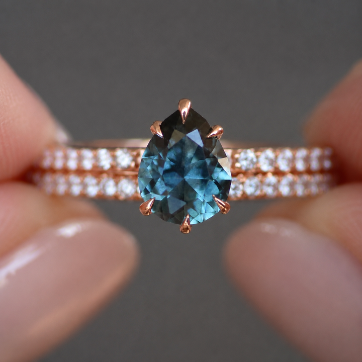 Pear Cut Teal Montana Sapphire Hidden Halo Engagement Ring Set with Matching Diamond Wedding Band in 14K Gold