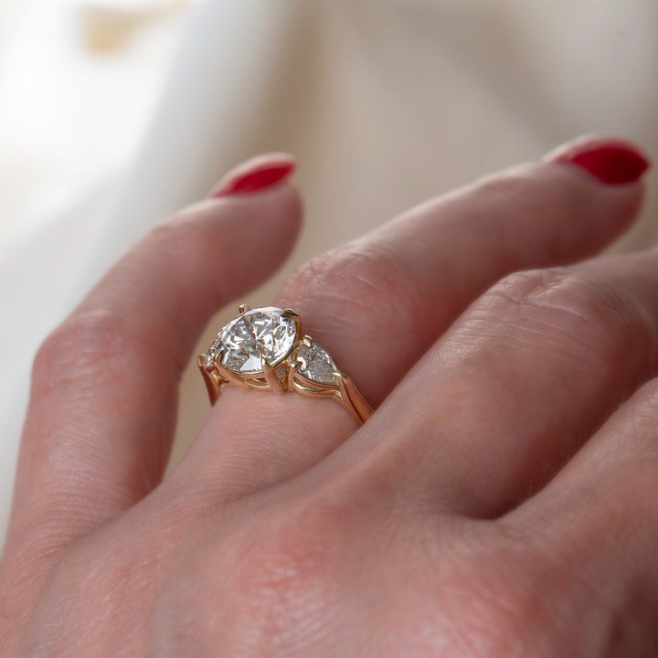 Lab Grown Diamond Three Stone Engagement Ring with Round Center & Pear Side Diamonds in 14K Gold