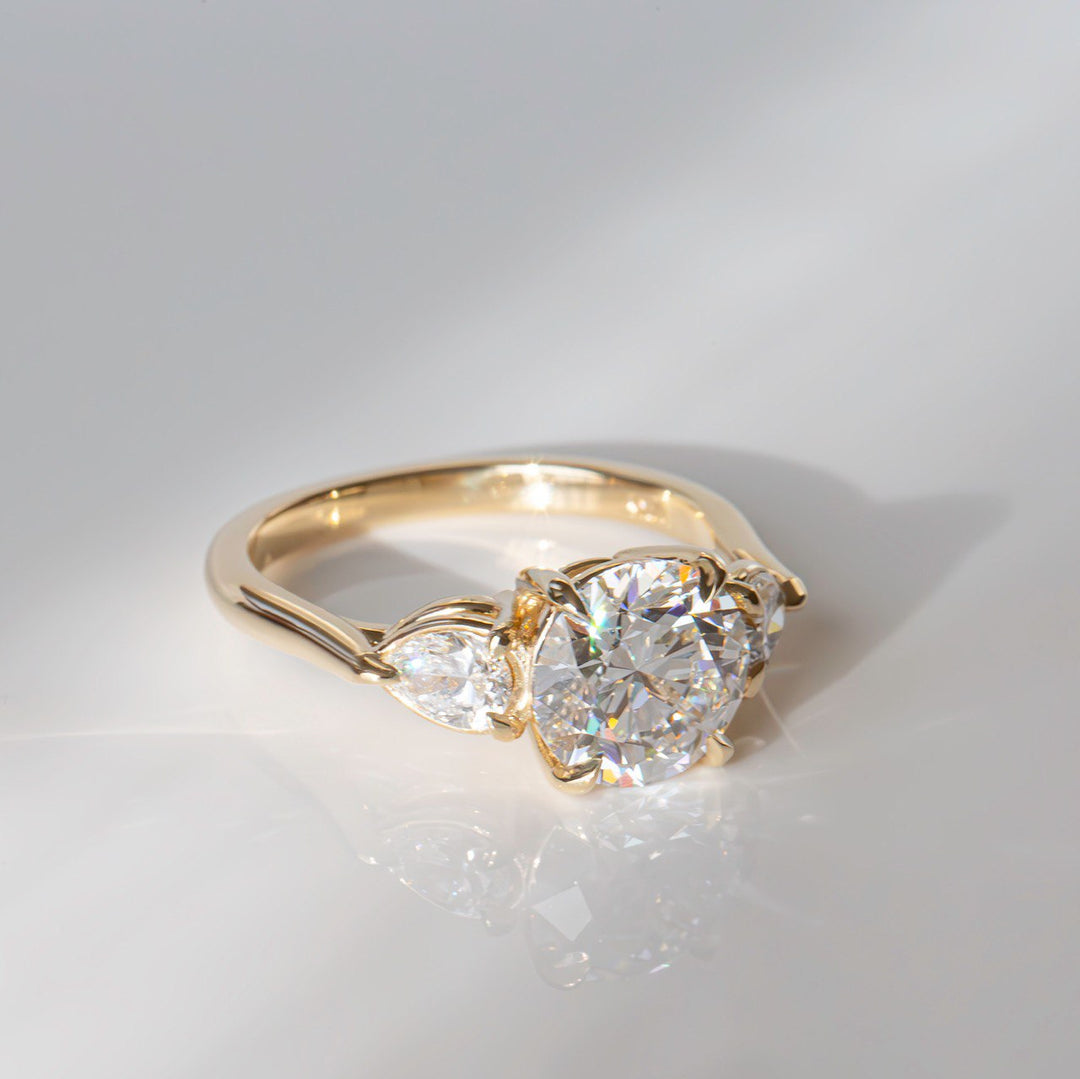 Lab Grown Diamond Three Stone Engagement Ring with Round Center & Pear Side Diamonds in 14K Gold