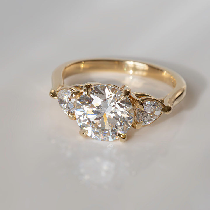 Lab Grown Diamond Three Stone Engagement Ring with Round Center & Pear Side Diamonds in 14K Gold