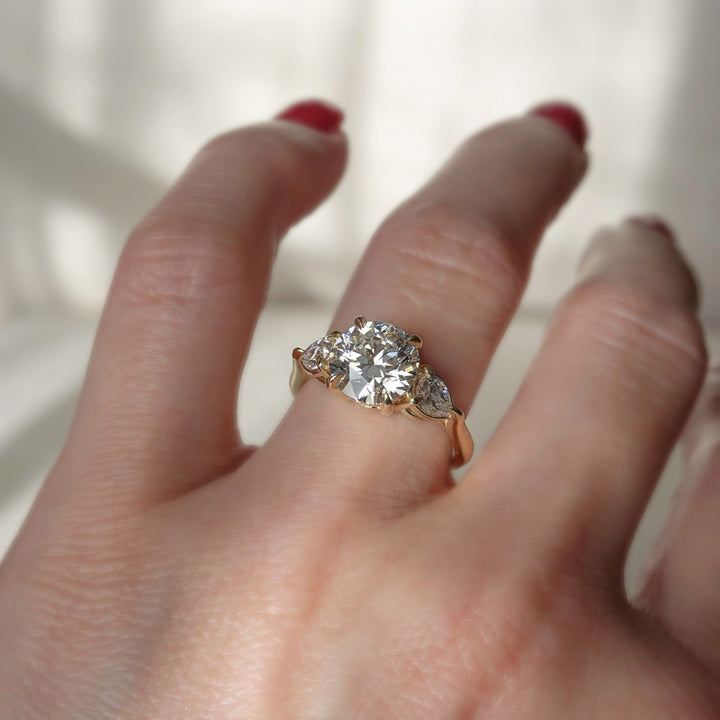 Lab Grown Diamond Three Stone Engagement Ring with Round Center & Pear Side Diamonds in 14K Gold